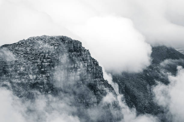 istock Clouds rolling over Table Mountain in Cape Town, Southafica. This fenomenon is called Tablecloth. 1198395796