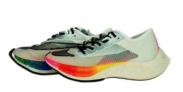 istock running shoes on isolated white background,closed up ,side view 1198396239