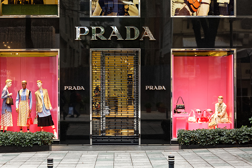 Nisantasi, Istanbul / Turkey - January 05 2020: Prada store facade displaying mannequins with women's collection in display window at Nisantasi Street.