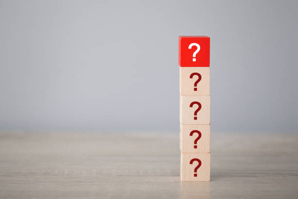 istock Arranging wood block stacking with icon question mark,thinking with question mark concept. 1198397361