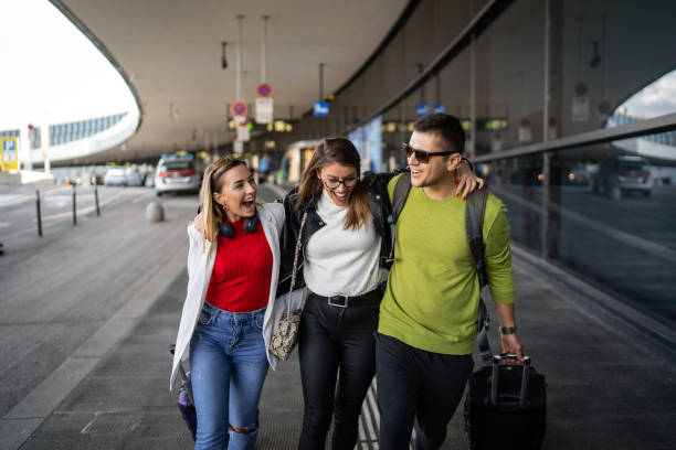 istock Friends at the airport 1198397517