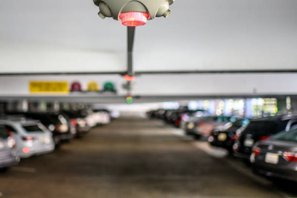 istock Car parking slot availability indicators placed on a garage ceiling 1198397867