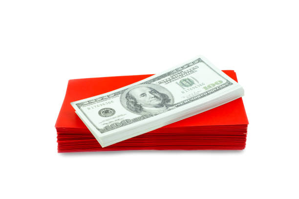 Money 100 Us Dollar Bills In A Red Envelope At White Background