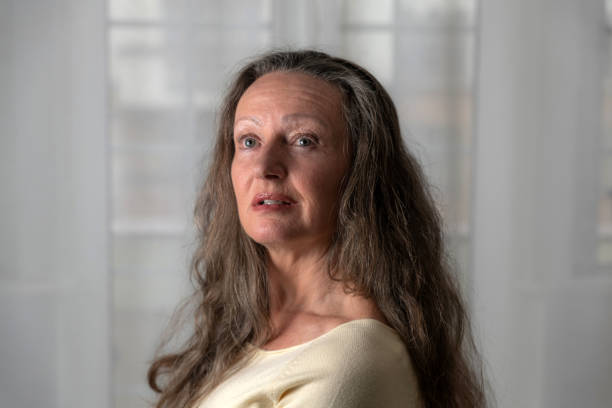 istock Attractive mature woman at home 1198401446