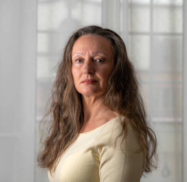istock Attractive mature woman at home 1198401468