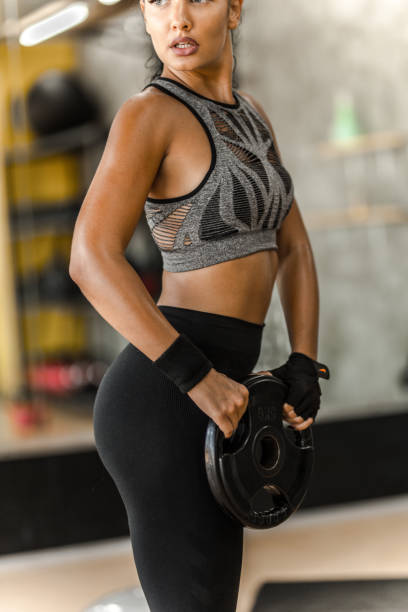 istock Women working out in a Gym 1198405404