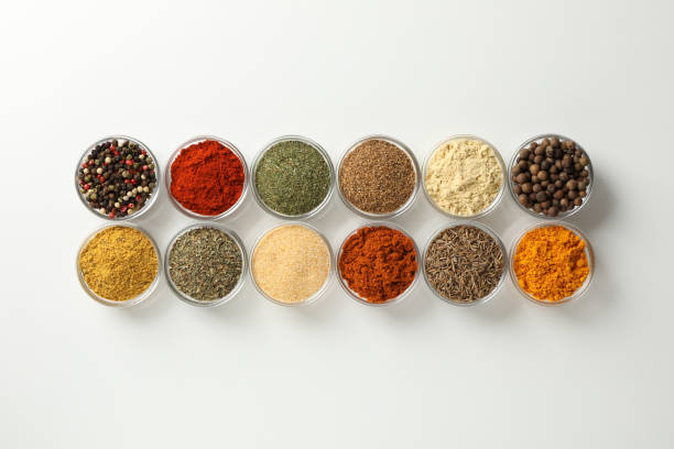 istock Flat lay. Bowls with different spices on white background, space for text 1198407248