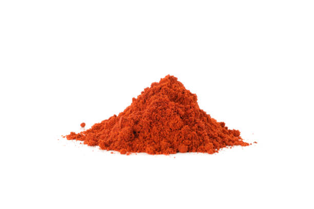 istock Bunch of red pepper powder isolated on white background 1198407298