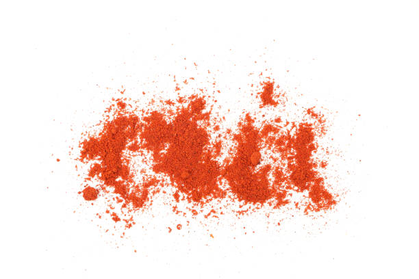istock Red pepper powder isolated on white background, top view 1198409608