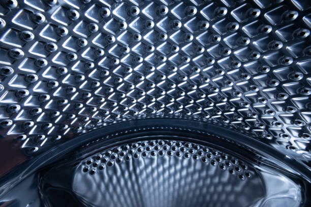 istock Stainless steel drum of a washing machine 1198410836