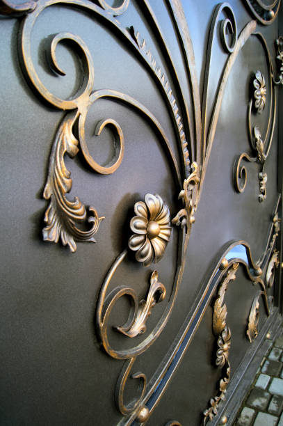 istock Modern metal doors decorated with forged elements with flowers 1198411076