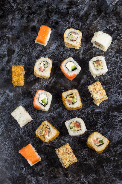 istock Set of sushi and maki on stone table. Top view 1198411763