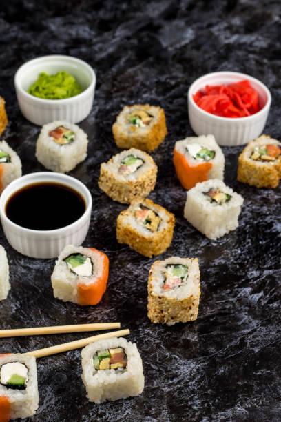 istock Set of sushi and maki on stone table. Top view 1198411794