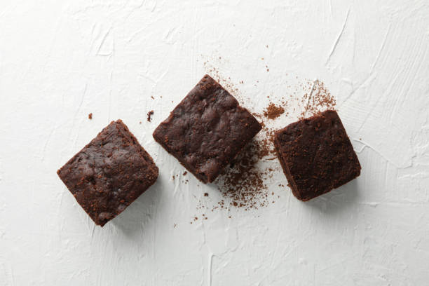 istock Chocolate cake slices on white background, top view 1198413218