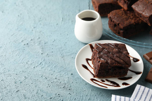 istock Composition with chocolate cake slices on blue background, space for text 1198413908