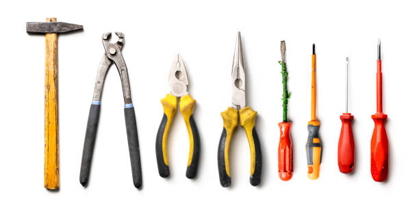 istock Many used working tools isolated on white. Screwdriver, hammer, pliers 1198414752