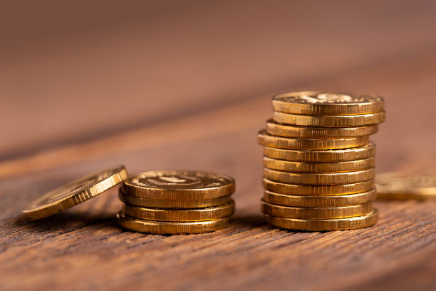 istock Gold coins close up. 1198415194