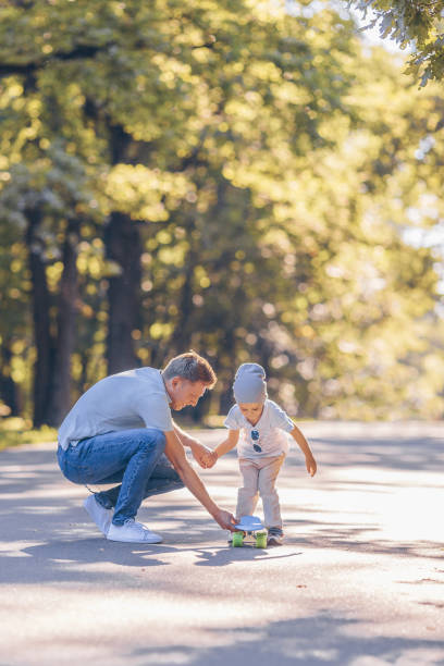 istock Father and son in the park 1198416541