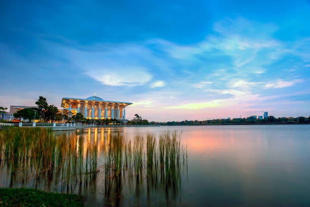 istock Amazing sunset at mosque with lake background. 1198418362