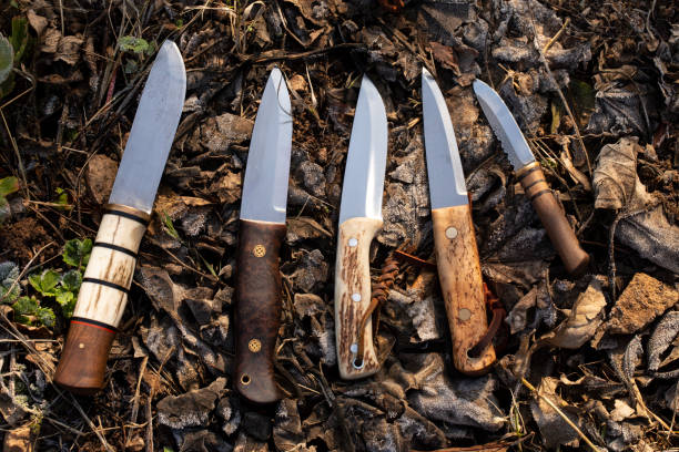 istock survival knives in nature 1198418689