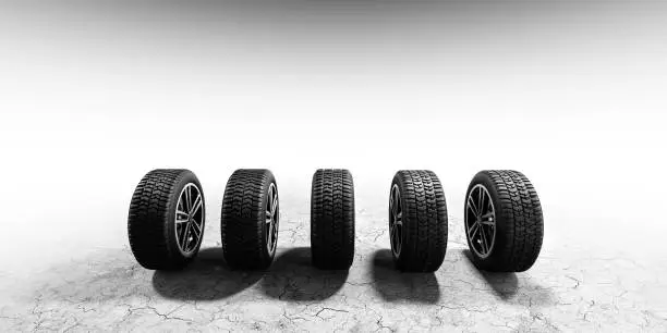 Wheels with modern alu rims on white background - banner. 3D illustration