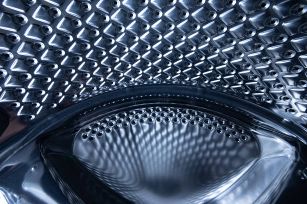 istock Stainless steel drum of a washing machine 1198423222