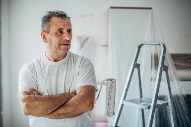 istock Professional occupation painting apartment walls 1198424565