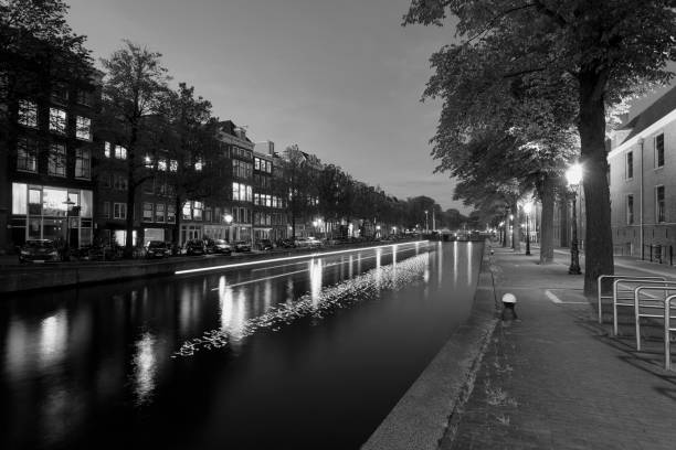 istock Amsterdam city canal at night 1198424613