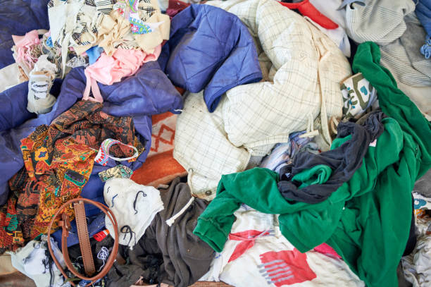 istock Recycling industry - old and dirty clothes. 1198424680