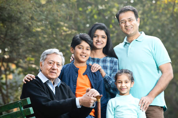 istock Multi generation Indian family at park 1198426982