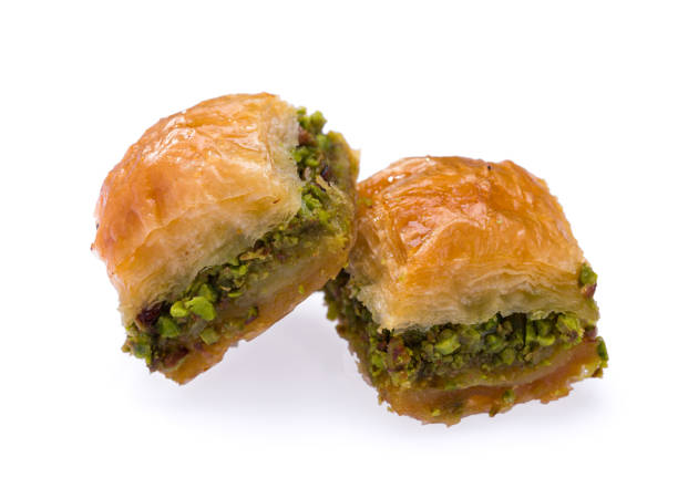 istock Sweet baklava on white background 1198430176