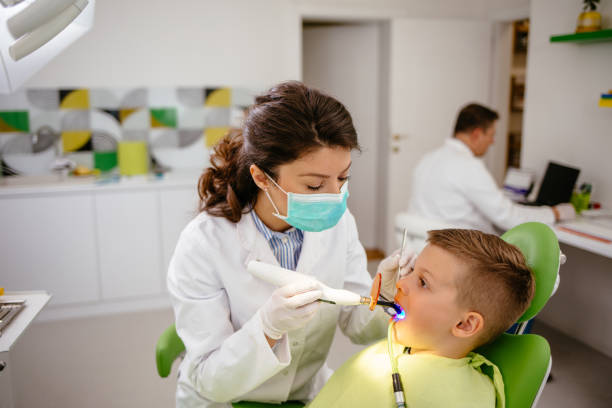 istock Little boy at dentist's office 1198433081