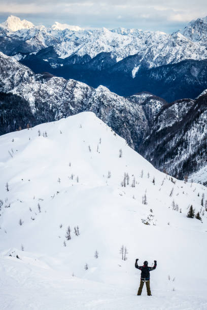 istock Man admiring a beautiful mountain view 1198433793