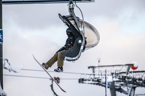Man snowboarding in Ski Resort, Austria, Nassfeld. GoPro.