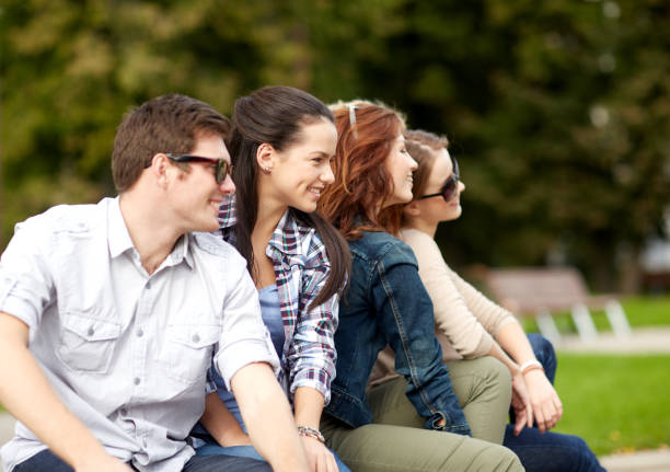 istock group of students or teenagers hanging out 1198435775