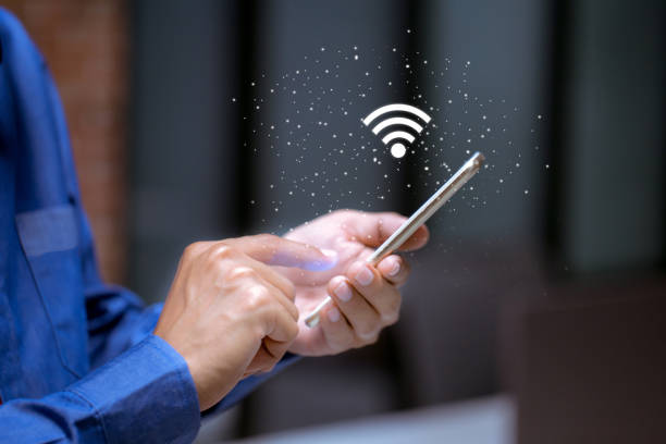 istock Business using smartphone,with wifi icon,business communication social network concept. 1198439457