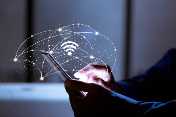 istock Business using smartphone,with wifi icon,business communication social network concept. 1198439501