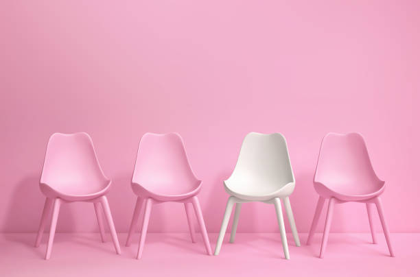istock Modern pink and white chairs standing in pink room 1198439823