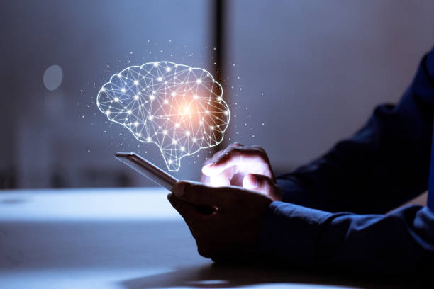 istock Business using smartphone,with brain icon,creativity and innovative are keys to success,new ideas and innovation concept. 1198441989