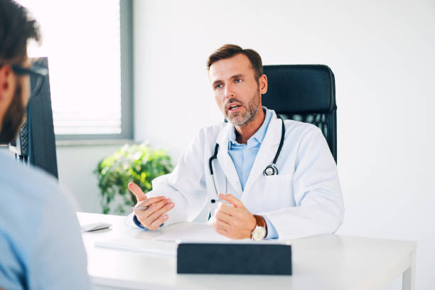 istock Doctor explaining treatment procedures and medication to patient 1198443534