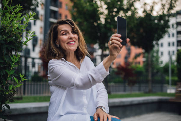 istock Senior woman taking a selfie 1198447250