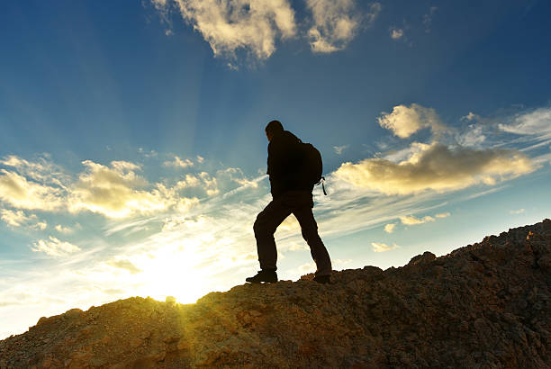 istock A man standing on top of the mountain 119844744