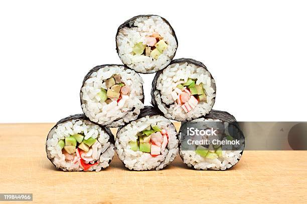 Rollos De Sushi Foto de stock y más banco de imágenes de Aguacate - Aguacate, Alimento, Arroz - Comida básica