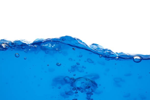 An expanse of blue water, covered in ripples and small waves.