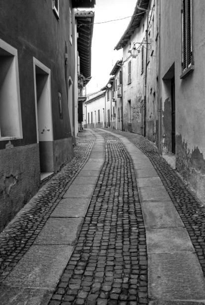 Old Italian village alley. Black and white photo stock photo