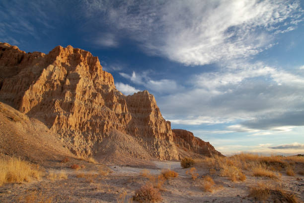 istock Dramatic sandstone rock formations in a desert canyon. 1198451921