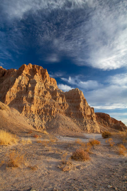 istock Dramatic sandstone rock formations in a desert canyon. 1198451924