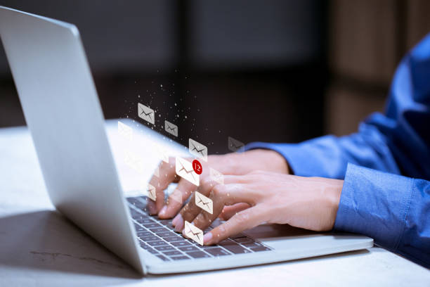 istock Business using laptop,with email icon,email inbox electronic communication graphics concept. 1198452085