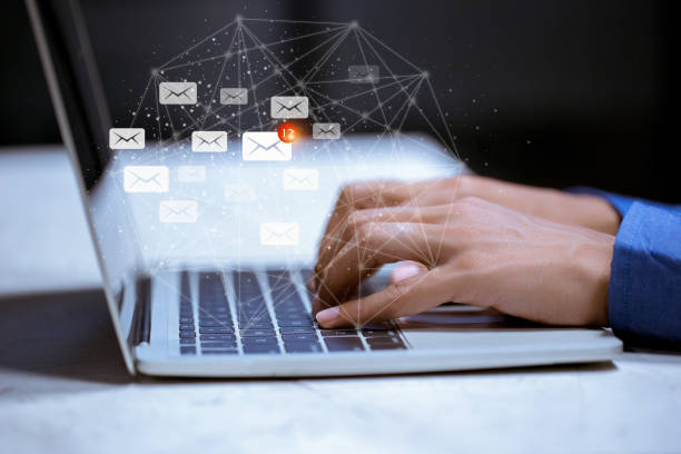 istock Business using laptop,with email icon,email inbox electronic communication graphics concept. 1198452383