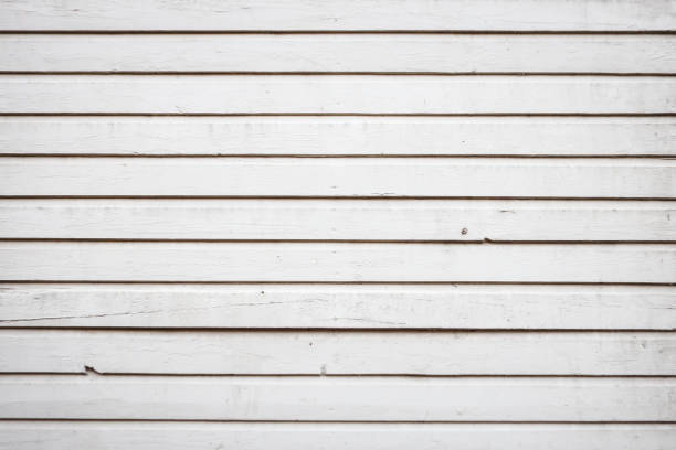 istock Old, white abstract house exterior wall from wood. 1198452866